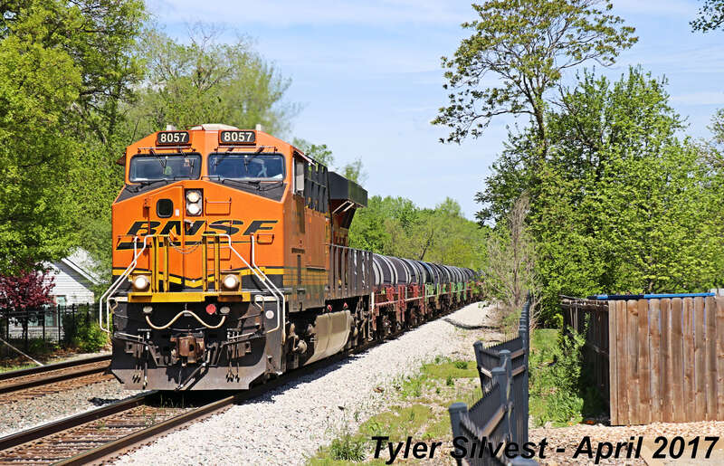 Burlington Northern Santa Fe 8057(ES44C4), 6904(ES44C4) and 4968(C44-9W) Leading a Westbound Coil Steel on the Emporia Sub near the Santa Fe Street crossing west of Kansas Avenue in Olathe, KS.
Video Link: 
Photo Taken: 4-22-17 at 12:30 pm

Picture