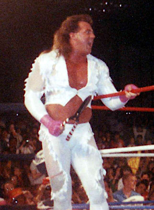 Professional wrestler Edward "Brutus Beefcake" Leslie in his barber gimmick, with accompanying shears with which he would threaten opponents.