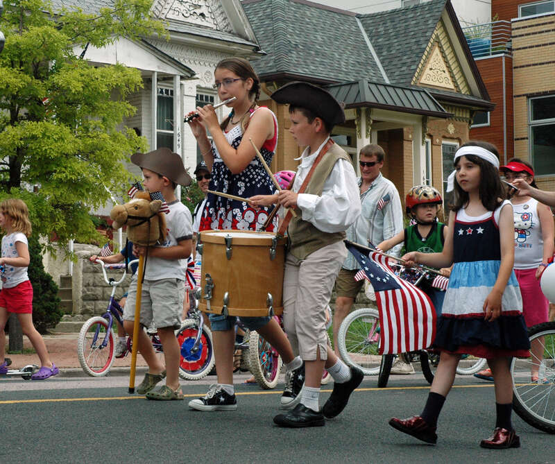Children with uniforms, instruments and flags, Boulder Street 4th of July parade, Denver, 2009