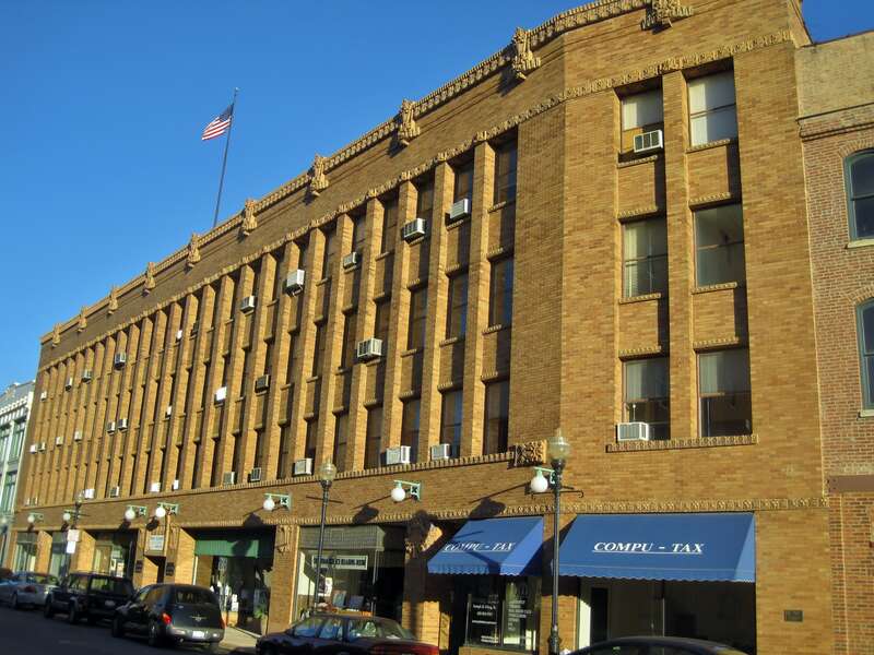 Keystone Building in Aurora (1922). It was built on land that had been owned by the Aurora Slverplate Company before it was destroyed in a fire. It was George Grant Elmslie's first commission after he and William Gray Purcell decided to end their