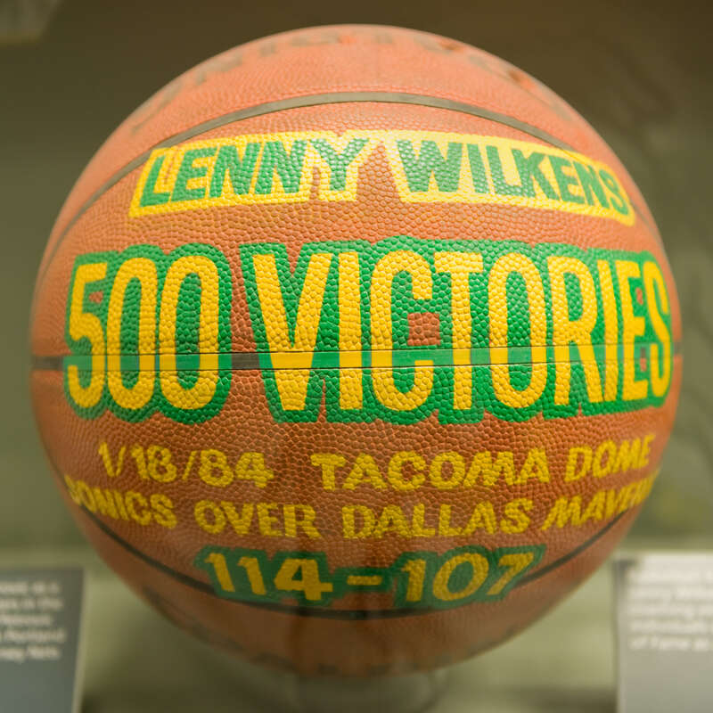 Basketball from the 1985 game in which Lenny WIlkens recorded his 500th NBA coaching victory. WIlkens is one of only two individuals enshrined in the Baseketball Hall of Fame as a player and a coach.