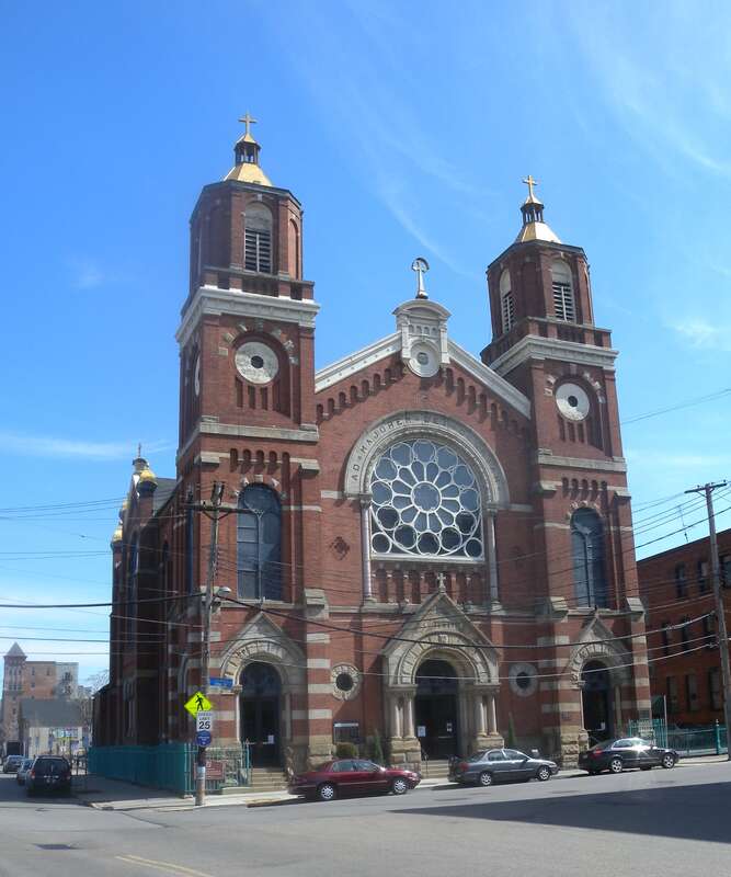 Looking east at church on a sunny midday.