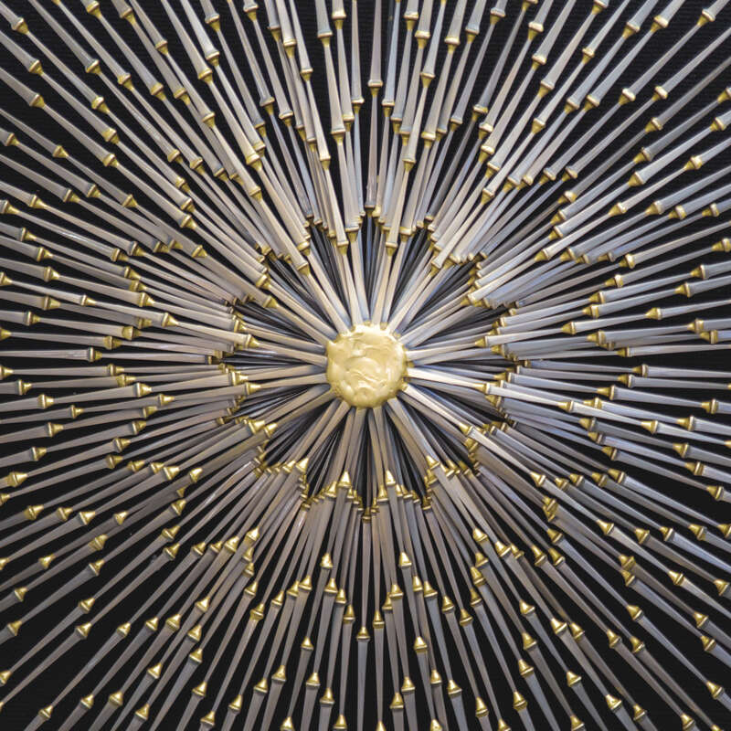 
500px provided description: A sunburst pattern seen at the Raleigh Arts Festival [#abstract ,#pattern ,#beam ,#sculpture ,#lines ,#shapes ,#symmetry ,#centered ,#circular ,#sunburst ,#radial ,#radiant]