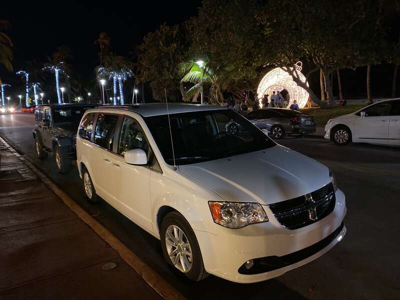 2019 Dodge Grand Caravan (RT) minivan finished in white. Photographed while parked on Ocean Drive in Miami Beach, Florida