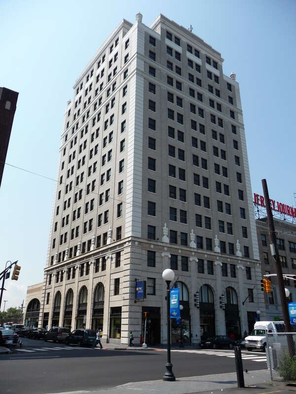 Exterior view looking west across Sipp Avenue and Enos Place at 26 Journal Square, Jersey City, New Jersey, USA.