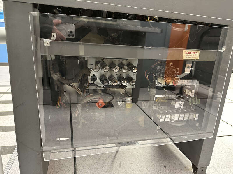 Back of an IBM 026 keypunch at the Computer History Museum, showing vacuum tubes and other internal components