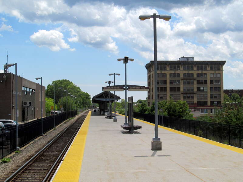 Brockton station platform and the Anglim Building in June 2017