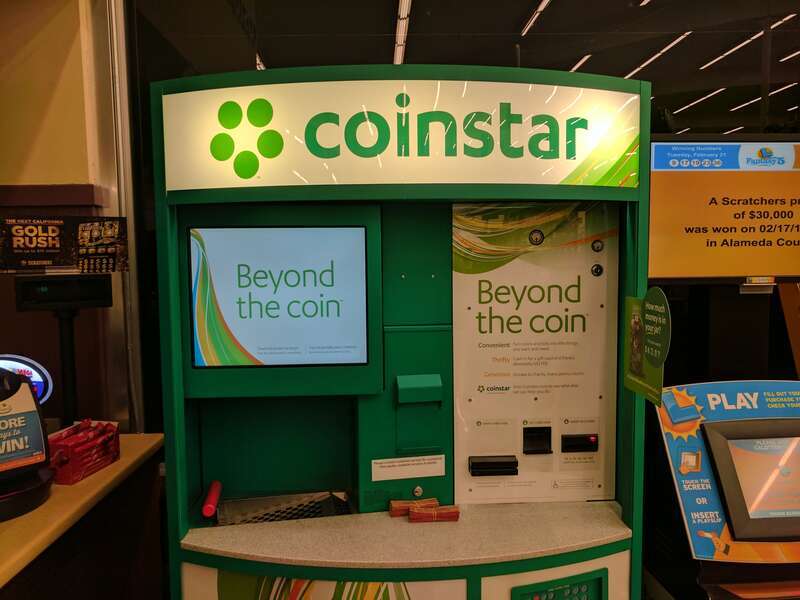 a coin-sorting machine exchanging loose change for scrips or gift vouchers, in the United States of America. See also a video of the machine in action.