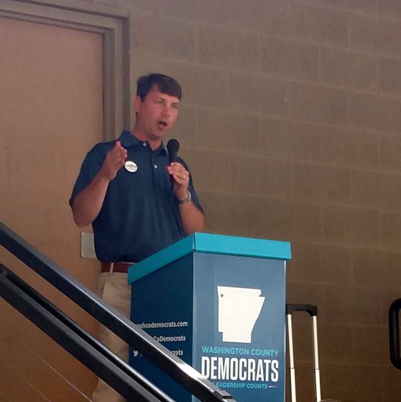 Conner addresses a rally of the Washington County Democrats at Shiloh Square in Springdale, Arkansas