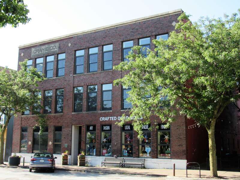 Crane Company building in the Davenport Motor Row and Industrial Historic District, Davenport, Iowa. The building is a expansion and renovation of an 1888 building that housed Reimers &amp; Fernald Co., a candy and cracker manufacturing plant, and