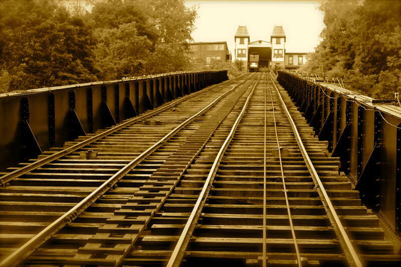 Ascends the north flank of Mount Washington above the Ohio River.  Sepia-tone image.