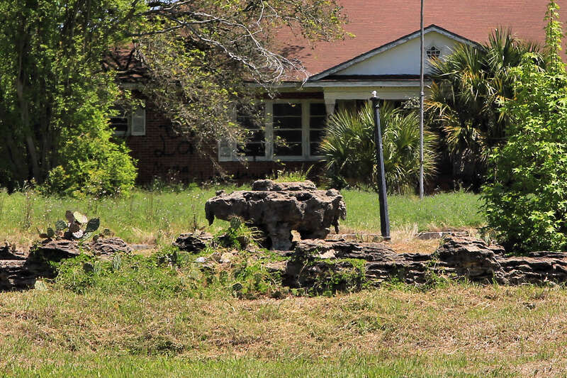 The rock fountain at the entrance to Eddingston Court in Port Arthur, Texas, United States. The fountain is a sculpture by Dionicio Rodriguez.