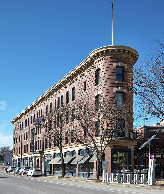 A flatiron-shaped building housing a hotel fittingly called the Hotel Flatiron in Omaha — Nebraska's largest city.