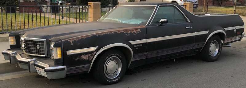 Ford Torino Ranchero pickup truck, this one is in black.