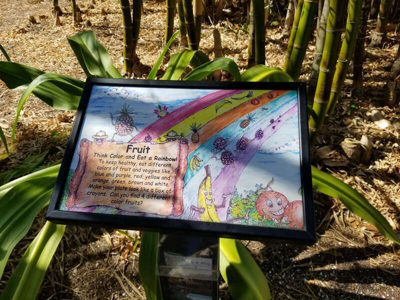 Fruit Garden Sign for Children at Florida Botanical Gardens. The sign encourages children to "make your plate look like a box of crayons."