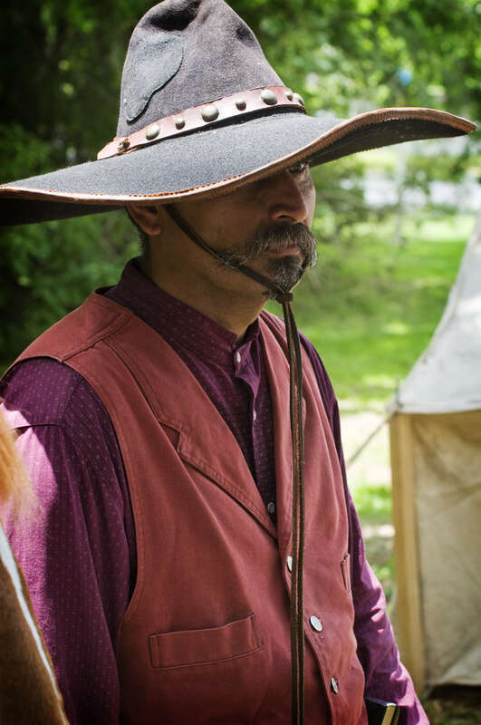 Man portraying gunslinger at the Butler Longhorn Museum Wild West Show in League City