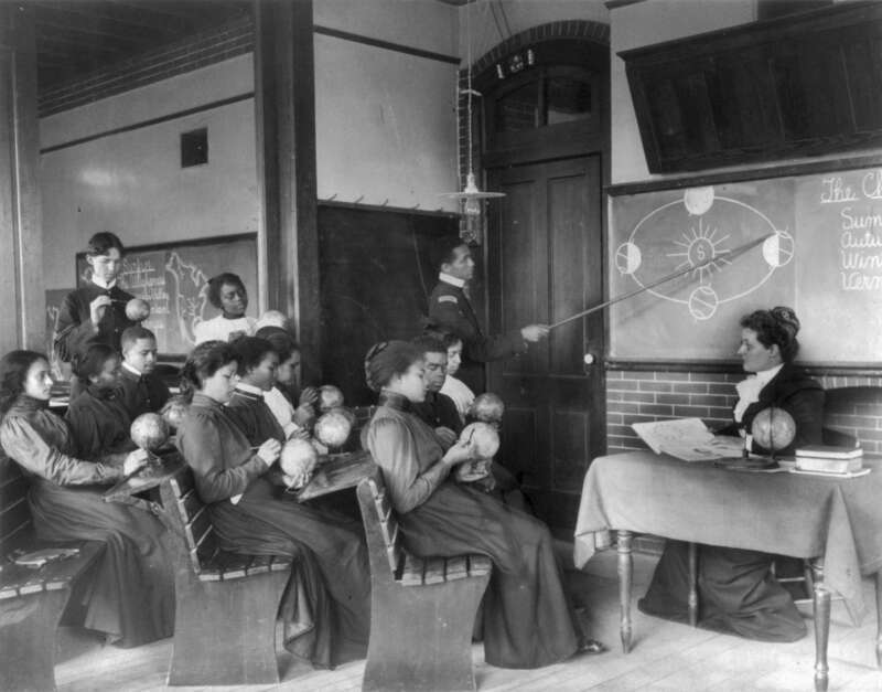 A class in mathematical geography studying earth's rotation around the sun, Hampton Institute, Hampton, Virginia