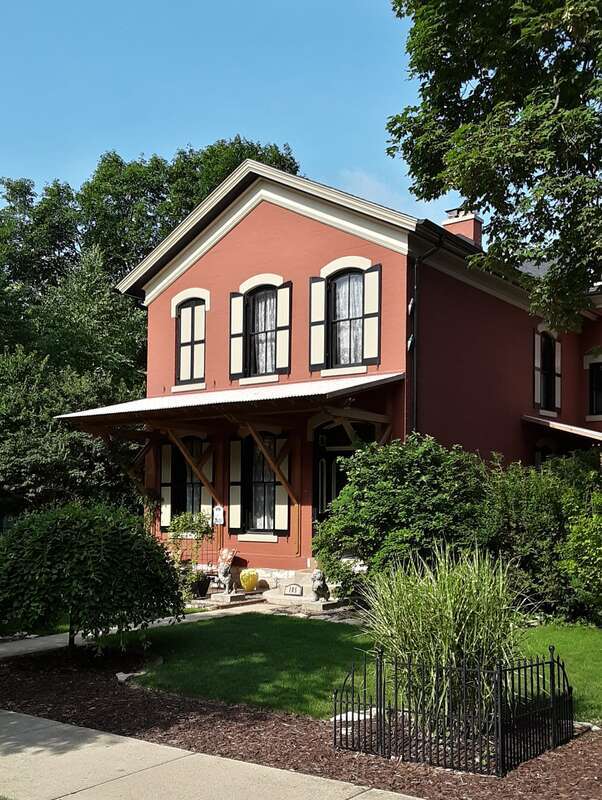 This Italianate Style brick home on N. Ellsworth Street, Naperville was built in 1870 for William Hillegas, an early hardware merchant. The home was later purchased by North Central College English professor, founder and editor of the Naperville SUN