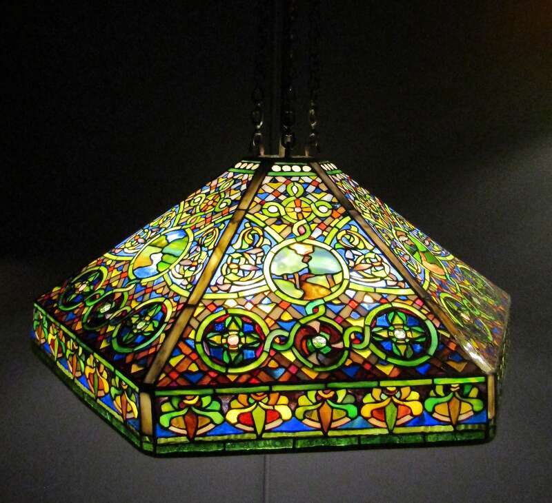 Tiffany glass hanging lampshade made out of leaded glass and bronze (circa 1905).