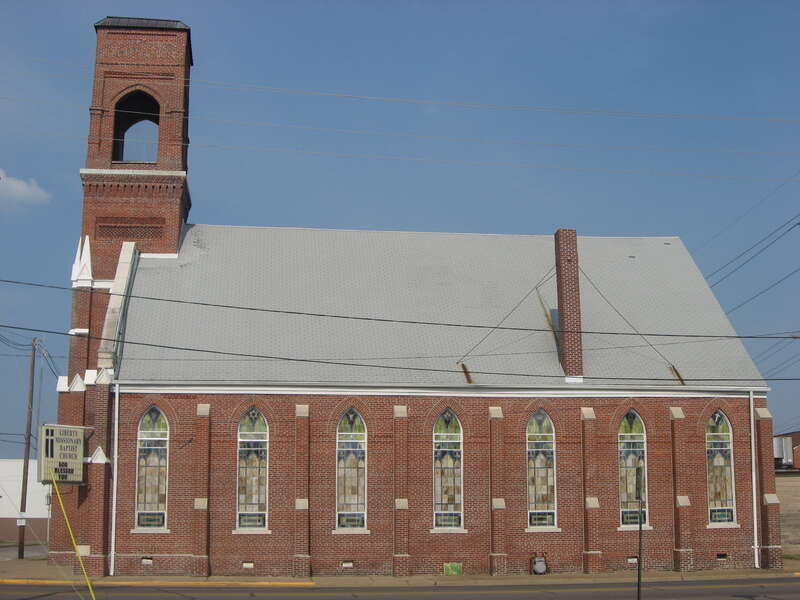Western side of Liberty Missionary Baptist Church, located at 701 Oak Street in Evansville, Indiana, United States.  Built in 1886, it is listed on the National Register of Historic Places.