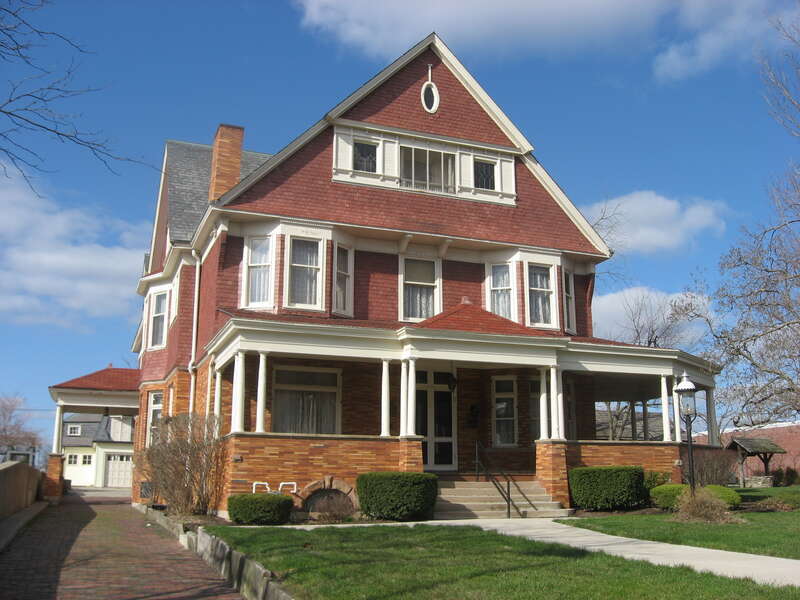 Front and western side of the MacDonell House, located at 632 W. Market Street in Lima, Ohio, United States.  Built in 1893 and currently used as the museum of the Allen County Historical Society, it is listed on the National Register of Historic