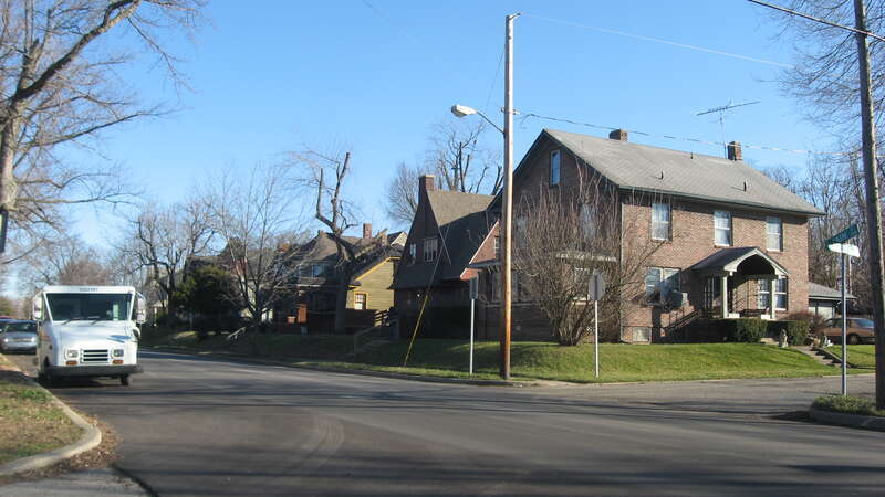 Houses on the southern side of Main Street (State Road 32) just east of the Wolfe Street junction in Muncie, Indiana, United States.  This block is part of the Kirby Historic District, a historic district that is listed on the National Register of