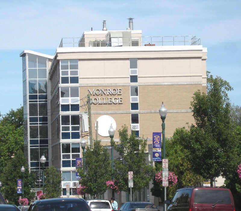 Looking northeast along Main Street, formerly called Boston Post Road, at w:Monroe College in w:New Rochelle, New York on a sunny midday
