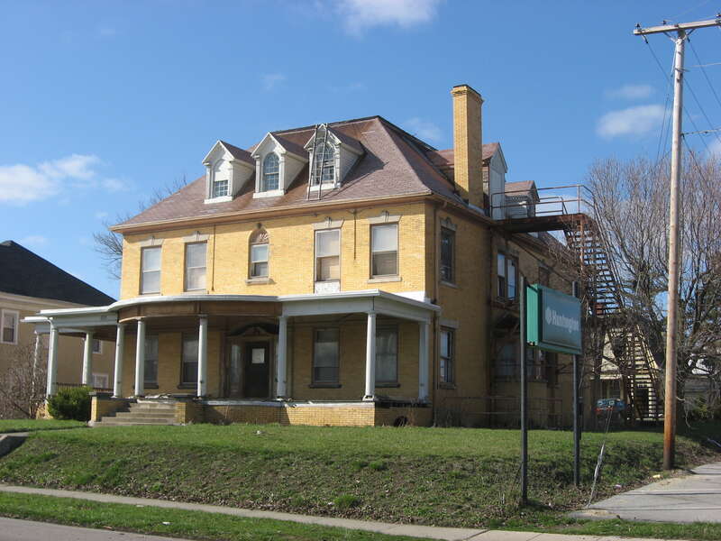 Front and eastern side of the Neely-Sieber House, located at 620 W. Spring Street in Lima, Ohio, United States.  Built in 1904, it is listed on the National Register of Historic Places.