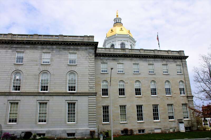 Side elevation of the New Hampshire State House from Capitol Street in Concord.