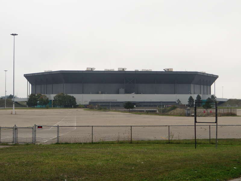 The Pontiac Silverdome, formerly known as the Silverdome, was a stadium located in Pontiac, Michigan, United States. It opened in 1975 and sits on 127 acres (51 ha) of land. When the stadium opened, it featured a fiberglass fabric roof held up by air