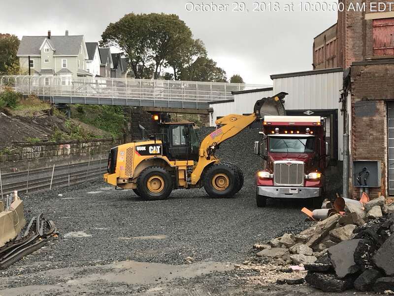 Removing ballast at Gilman Square station site in October 2018