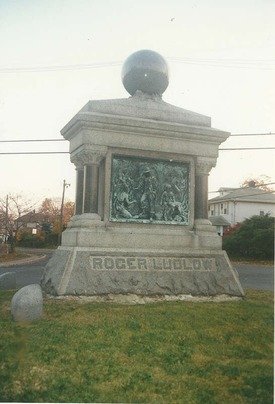 The Roger Ludlow Monument located in the traffic circle at the confluence of Gregory Boulevard and Marvin Street in East Norwalk, Connecticut. Ludlow was the founder of first European settlement in Norwalk. The work was dedicated in 1895.