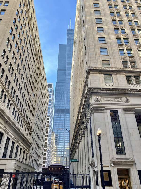 Built in 1970-1974, this Modern International-style skyscraper was designed by Skidmore, Owings and Merrill and Fazlur Rahman Khan for Sears, Roebuck and Company, replacing their earlier headquarters in Chicago’s North Lawndale neighborhood where the