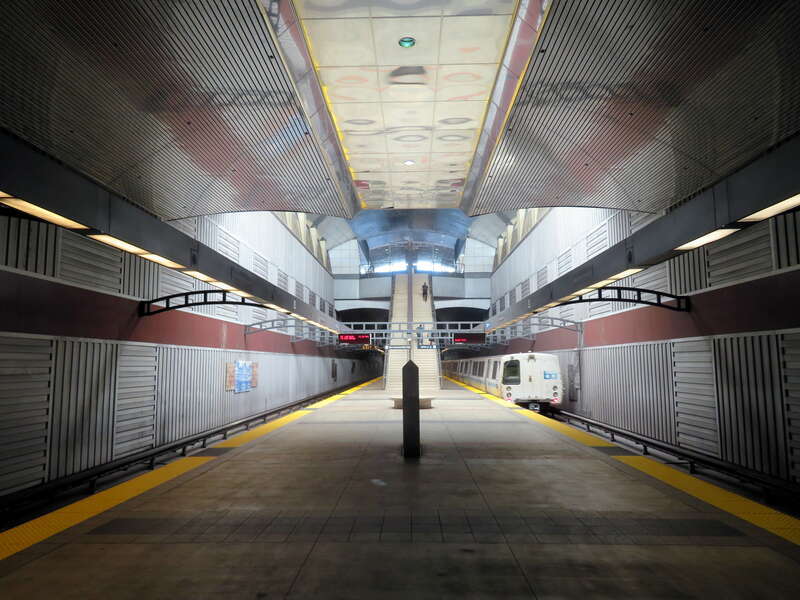 A southbound train leaving South San Francisco station in June 2018