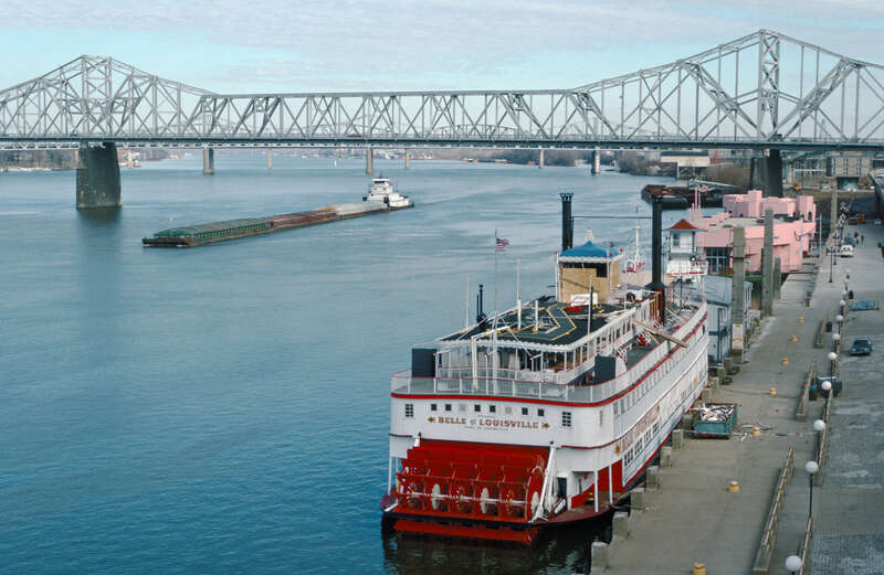 Steamboat "Belle of Louisville" at wharf, with Clark Bridge in distance 
Louisville, Kentucky, USA 

Ohio River mile 604