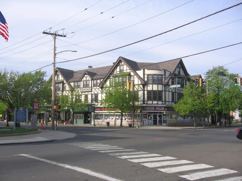 Looking northeast from the Green at the half timbered building across the intersection of Main Street (runs from lower right to mid left) and Campbell Avenue (runs from left down to lower right) in West Haven, Connecticut.