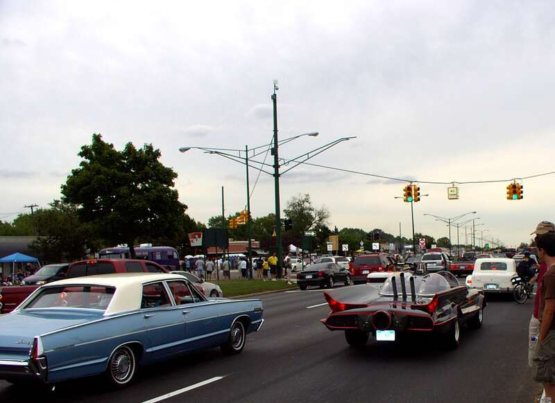 M-1 (Woodward Avenue) and Lincoln Street in Birmingham, Michigan during the Woodward Dream Cruise showing a replica Batmobile