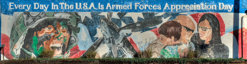 Patriotic mural on building in Commercial Circle