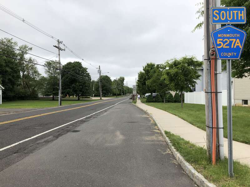 View south along Monmouth County Route 527 Alternate (Main Street) at Matlosz Court in Englishtown, Monmouth County, New Jersey