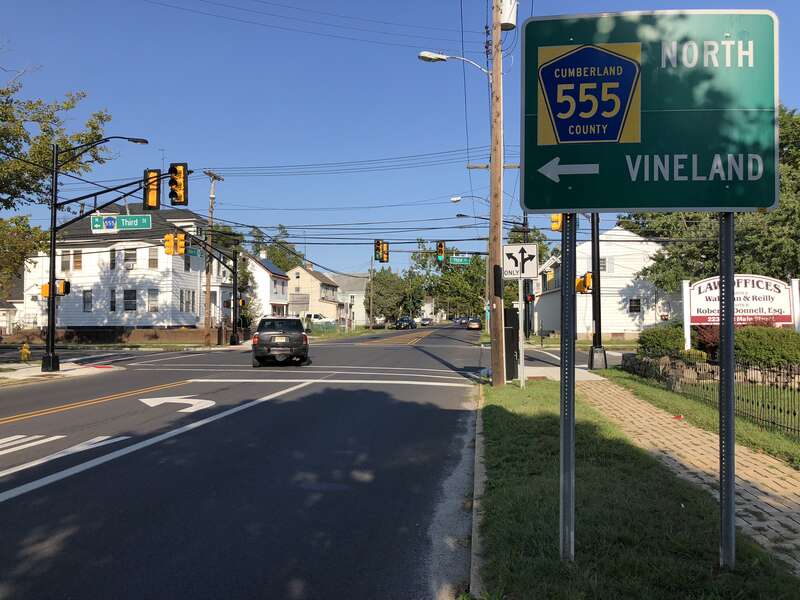 View east along New Jersey State Route 49 and north along Cumberland County Route 555 (Main Street) at Cumberland County Route 555 (Third Street) in Millville, Cumberland County, New Jersey