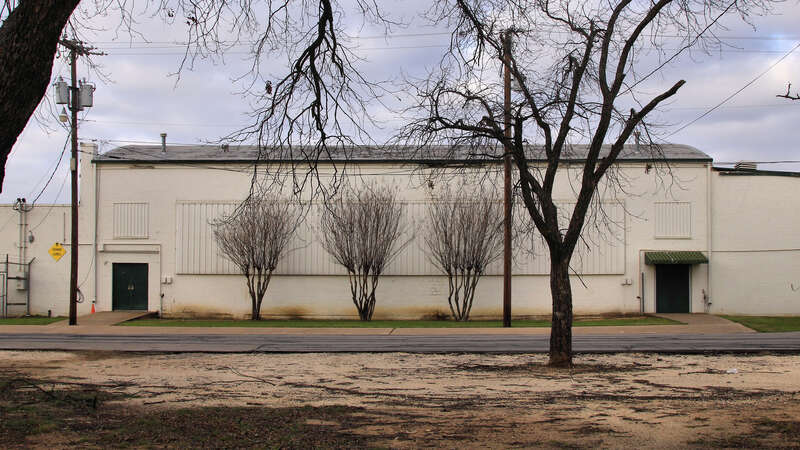 East side of the old Burleson Gymnasium in Burleson, Texas, United States.