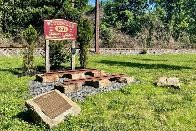Camden and Amboy Railroad Memorial near East Spotswood Park in Spotswood, New Jersey. The railroad reached the town in 1832. The display shows stone sleepers used as the foundation for the rails.