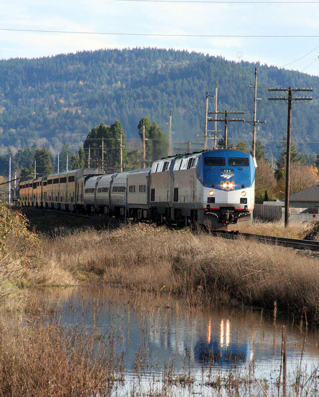 Amtrak Coast Starlight, #14 at the railroad location of West Springfield. West Springfield is physically east of East Springfield. This dates from the SP days, when the lines running to San Francisco were considered westbound, no matter which