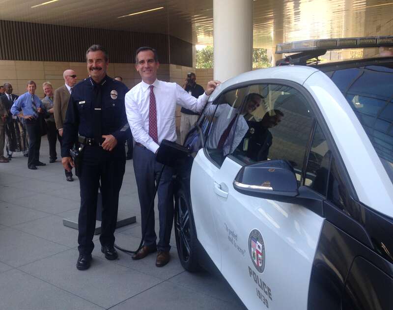 Mayor Eric Garcetti and Police Chief Beck showing their commitment to the environment and improved air quality by announcing the City's commitment to purchasing the largest of electric vehicle fleet in the US.