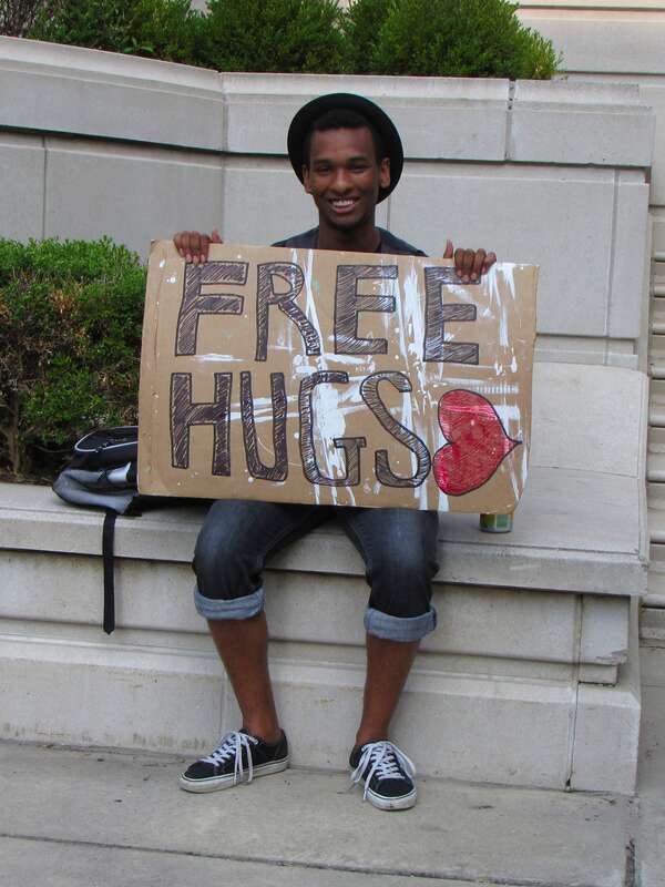 A man holds a "FREE HUGS" sign at Millennium Park in Chicago, Illinois.
More at The Schumin Web:
<a href="http://www.schuminweb.com/2011/08/11/and-fun-was-had-in-chicago-too/" rel="noreferrer