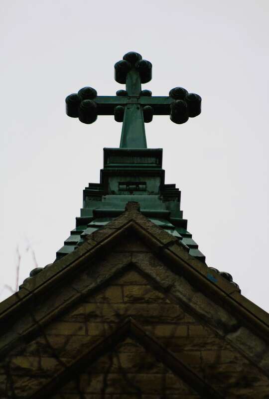 The cross on the top of the south transept of Holy Name Cathedral in Chicago, Illinois.