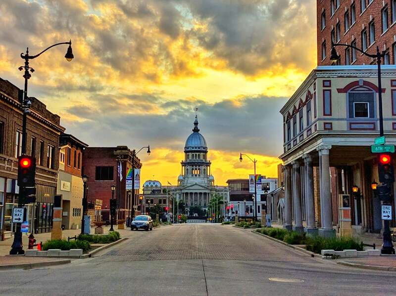 Illinois State Capitol as seen from the intersection of East Capitol Avenue &amp; Third Street at sunset
