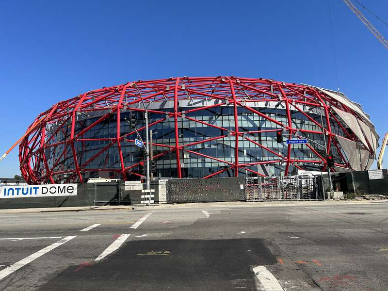 The Intuit Dome under construction from October 2023, as seen from the corner of S Prairie Ave and W 102nd St in Inglewood.