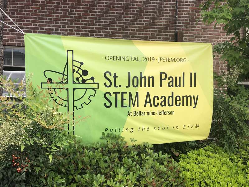 Banner outside the renovated John Paul II STEM Academy