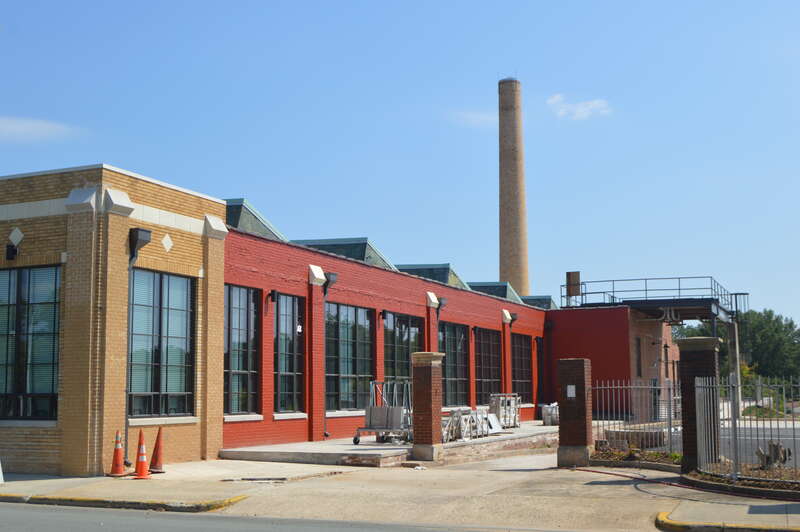 Western side of the May Hosiery Mills Knitting Mill (now an apartment building), located at 612 S. Main Street in Burlington, North Carolina, United States.  Built in 1928, it is listed on the National Register of Historic Places.